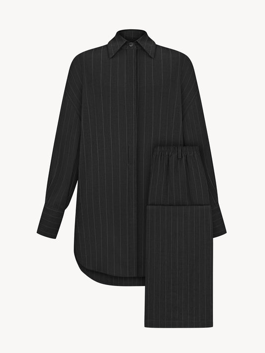 A striped linen suit in black with palazzo pants