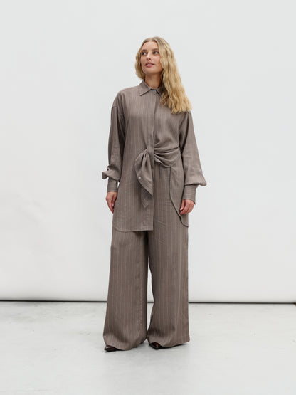 A linen striped suit with palazzo pants in light brown color