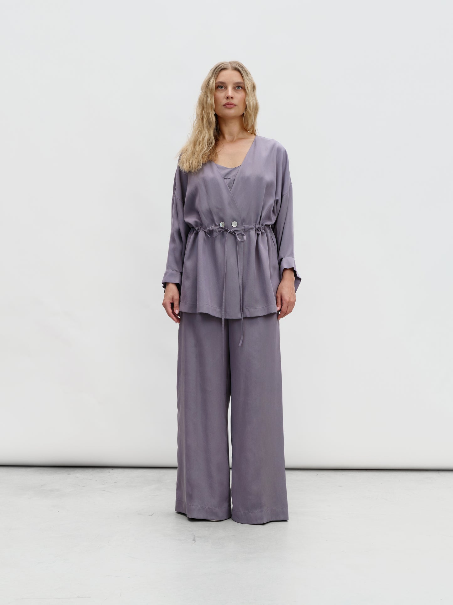 A graphite-colored eucalyptus kimono suit with palazzo pants