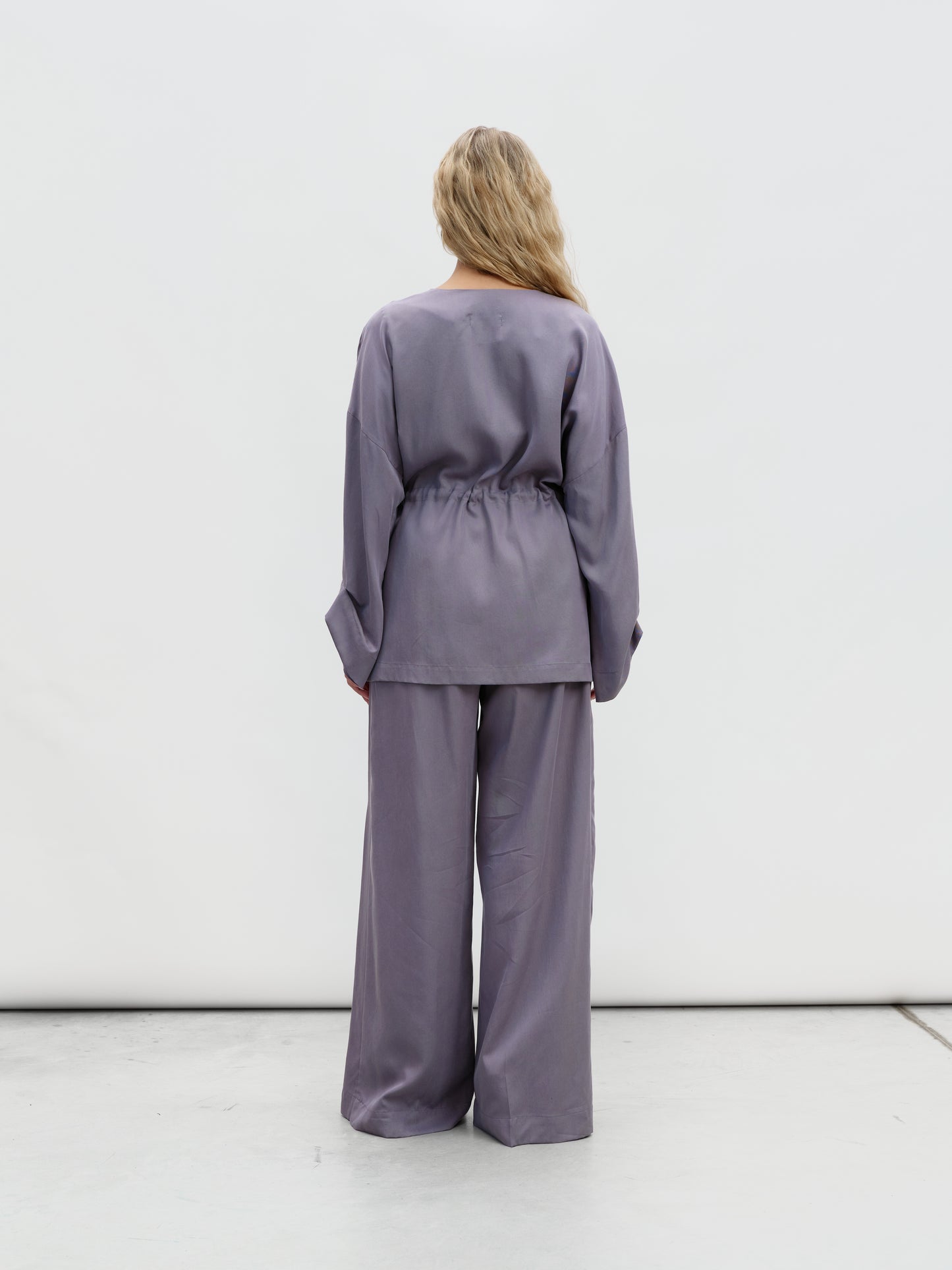 A graphite-colored eucalyptus kimono suit with palazzo pants