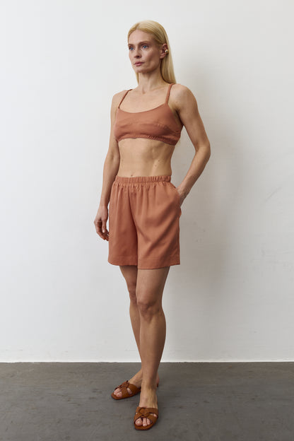 INES EUCALYPTUS SHORTS IN TERRACOTA